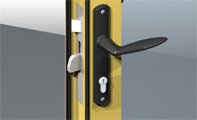 The dummy lock can be operated from inside, the handle retracts the shoot bolts top and bottom.